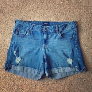 Blue denim shorts.